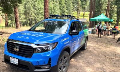 A truck provided by Western Washington Honda Dealers is parked near camp at the Winthrop Gravel Ride after hauling bikes and gear all day.